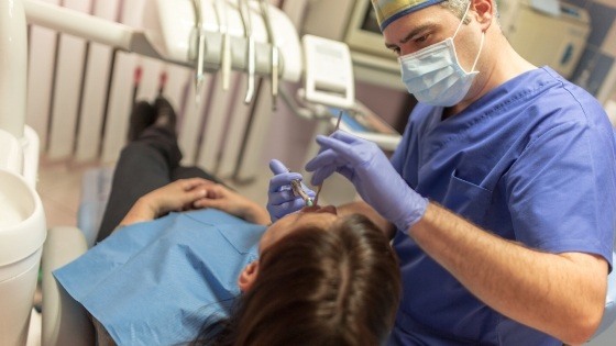 Doctor Sheraz treating a pediatric dental patient