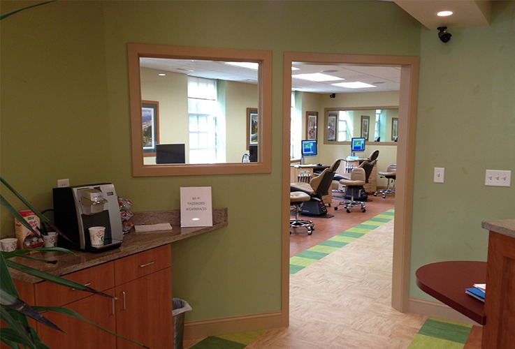 Welcoming reception area of pediatric dental office in Northampton